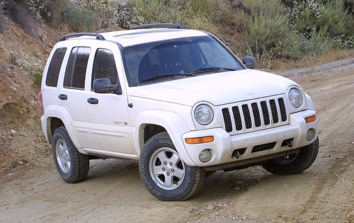 white jeep-cherokee-2002-kj-1